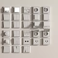 Various White Wall Mounted Switch Panels With Different Switches And Sockets