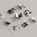 Open Books and Magazines Displaying Various Pages with Image and Text Content 3d model