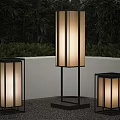 Modern Floor Standing Outdoor Lights With Black Frames Beige Shades And Green Plants In Garden