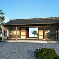 Traditional Ancient Chinese Building with Carved Windows Eaves and Stone Pavement Surrounded by Green Trees