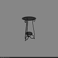 Wrought Iron Decorative Plant Stand Featuring Curved Design And Circular Tray Top