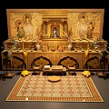 Ancient Architectural Shrine Interior Featuring Wooden Carvings Buddha Statue Altar Table And Traditional Carpet