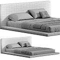 Minimalist Modern Bed With Upholstered Headboard Neutral Pillows And Knit Blanket