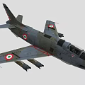 Military Fighter Jet With Camouflage Paint And Weapons Under Wings In Flight