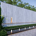 Outdoor Grey Stone Feature Wall With Lush Greenery Water Feature And Illuminated Lights