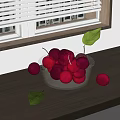 Juicy Red Plums in Glass Bowl on Wooden Countertop with Green Leaves and Window Blinds