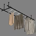 Metal Clothes Hanger With Hanging Sweaters Tank Tops And Casual Clothing