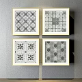 Four Framed Decorative Artworks With Geometric And Floral Patterns On Gray Wall