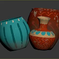 Three Decorative Ceramic Vases With Blue Red Patterns And Unique Designs