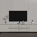 Elegant White TV Stand with Golden Accents and Decorative Items Under Black TV