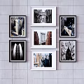 Colorful City Landscape Painting With Black And White Art Frames On Wall