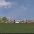 Modern Orange School Building With Glass Facade Green Lawn And Campus Surroundings