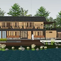 Traditional Waterfront Guesthouse Building With Wooden Terrace And Green Trees Around