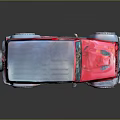 Red Off Road Jeep Style Vehicle With Blue Roof Large Tires And Rugged Body Design