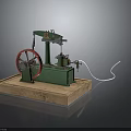 Mechanical Model of Spacecraft Propulsion Mechanism With Green Body Red Wheel and Wooden Base