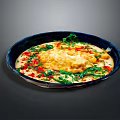 Appetizing Tasty Food in Black Plate with Yellow Main Red Garnish and Fresh Green Leaves