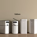 White Poliform Household Storage Containers On Wooden Floor With Light Wall