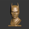 Golden Female Bust Sculpture With Bat Like Ears Helmet On Dark Background