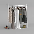 Stylish Layered Dresses In Various Colors On White Clothing Rack With Shoes