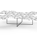 Modern Coffee Table With Irregular Marble Surface And Black Metal Frame