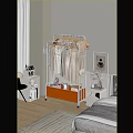 White Clothing Rack With Hanging Clothes Orange Drawer And Plush Toys For Bedroom Storage