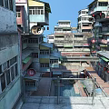 Dense Old Residential Buildings With Multiple Colorful Balconies And Drying Clothes