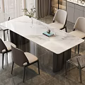 Modern Dining Table Set With Marble Top Beige Chairs And Decorative Vase Books