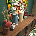 Vintage Daily Electrical Appliances Display With Thermos Flasks Table Lamp Alarm Clock On Wooden Cabinet