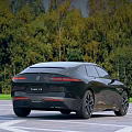 Modern Black Car With Sleek Exterior Design Parked Outdoor Near Green Trees