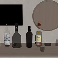 Stylish Wine Bottles and Cocktail Glasses Display on Shelf with Golden Cabinet and Round Mirror