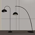 Arched Floor Lamps with Metallic Shade Against White Wall and Wooden Floor