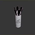 Tactical Weapon With Silver Cylindrical Body And Black Protruding Blade Components