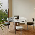 Minimalist Round Marble Table And Chairs Set With Floor Lamp Wooden Floor Green Plants View