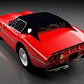 Red Classic Sports Car With Sleek Design Black Convertible Top And Silver Alloy Wheels