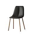 Modern Black Leather Single Chair With Sleek Wooden Legs And Minimalist Design