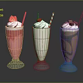 Pink White And Chocolate Milkshakes With Fresh Fruit And Chocolate Shavings In Glass Cups