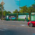 Urban Road Facilities With Green Bus Shelter Street Lights And Advertising Billboards