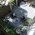 Garden Landscape Design With Wooden Deck Outdoor Dining Table Green Plant Wall And Flower Boxes