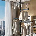 Modern Freestanding Clothes Rack With Hanging Clothes In Wardrobe And Laundry Area