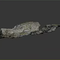 Natural Stone Formation With Mossy Green Surface And Rough Textured Details
