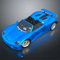 Blue Convertible Sports Car With Black Seats Spoiler And Silver Wheels