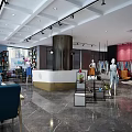 Modern Clothing Store Interior Design Showcasing Mannequins Clothes Comfortable Sofa And Marble Flooring