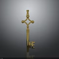 Golden Decorative Key With Cross Shaped Top Spherical Ornaments And Reflective Metallic Finish