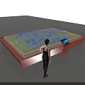 Interactive Sand Table with Blue Building Models Control Panel Screen and Person Standing 3d model