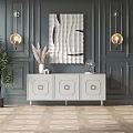 White Entryway Console Table with Three Circular Decor Drawers Gold Wall Lamps and Quilted Art