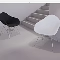Modern Black and White Leisure Chairs with Metal Wire Legs in Staircase Background