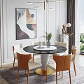 Round Marble Top Dining Table Set with Gold Base Beige Orange Chairs Green Decorative Plant