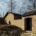Two People Walking Near Dilapidated Houses With Leafless Trees Barren Grassland Hills And Sky