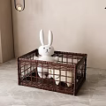 Brown Woven Storage Basket with White Rabbit Doll on Gray Floor in Indoor Space