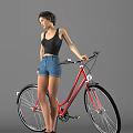 A Woman Wearing Black Tank Top and Denim Shorts Standing Beside Red Bicycle